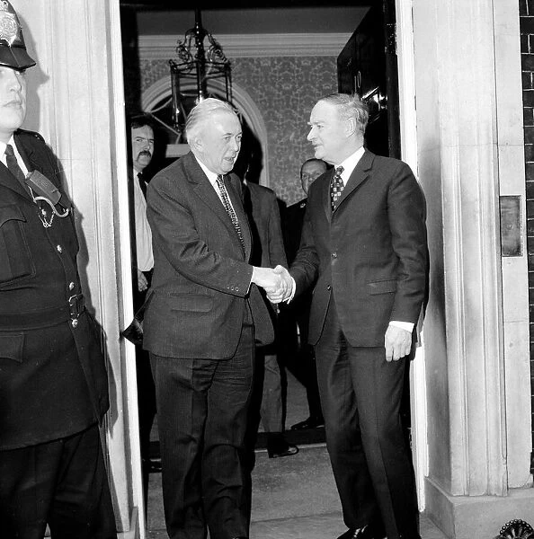 Mr. Harold Wilson saying goodbye to the Irish Prime Minister Liam Cosgrave on the steps