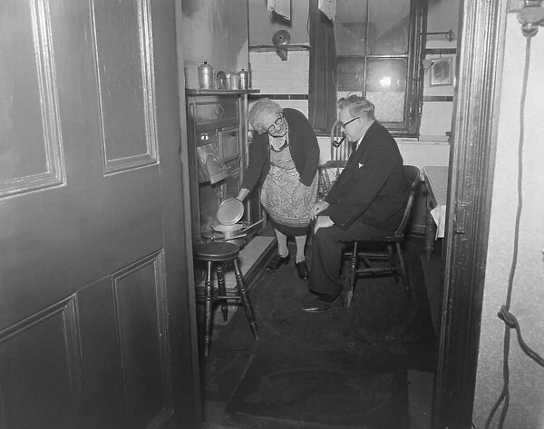 Mr Herbert Morrison stops for the night at the home of Mrs Lottie Bacon during his