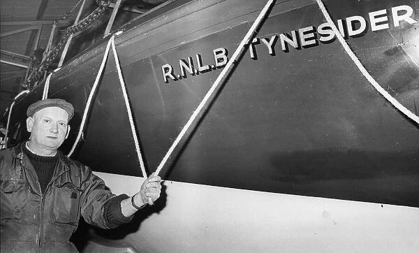 Mr. Jack Watson, a permanent RNLI mechanic, with the Tynesider lifeboat