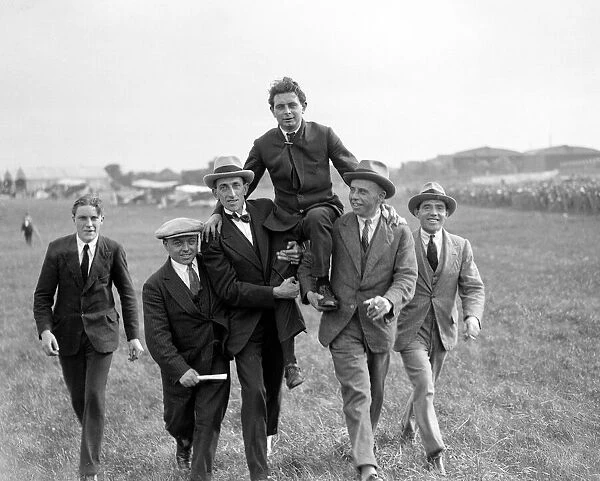 Mr Jimmy James, winner of the Aerial Derby at Hendon being chaired. 8th August 1922