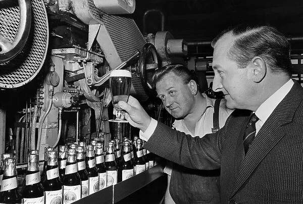 Mr Ken E J Morison (right) Brewing Director, Welsh Brewers Ltd