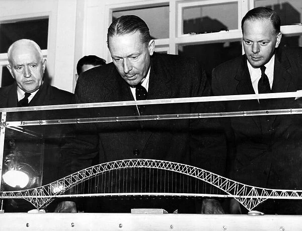 Mr. Kenneth Anderson (consulting engineer) looking at a model of the new Runcorn-Widnes