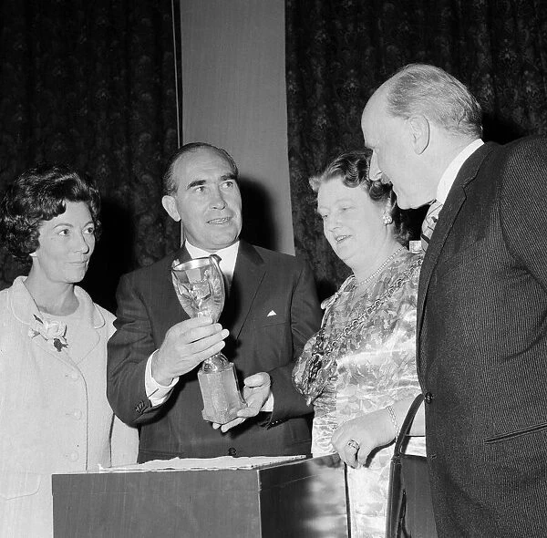Mr and Mrs Alf Ramsey with the Jules Rimet World Cup trophy flanked by Mr and Mrs Keeble