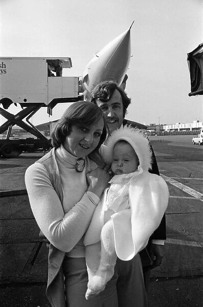 Mr and Mrs Frith with their 6 month old daughter Kathy on their arrival at Heathrow