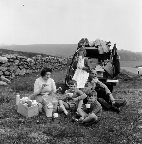 Mr and Mrs Geoffrey Bonnett of Ely, Cambridgeshire, stop for a picnic on the roadside