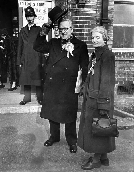 Mr. and Mrs. Herbert Morrison photographed after casting their votes in the East Woolwich