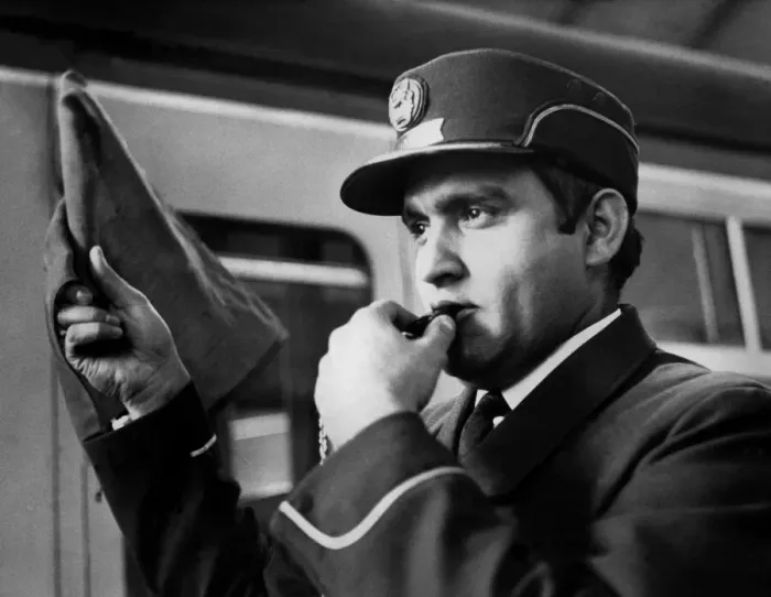 Framed Print : Mr. Prem Vohra, an inter-city rail guard, whistles out Framed Print : Mr. Prem Vohra, an inter-city rail guard, whistles out