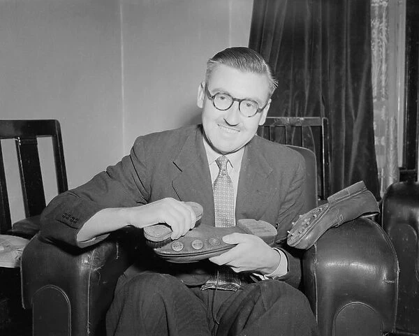 Mr Robert Hope seen here cleaning his shoes, 1st September 1953 Local Caption