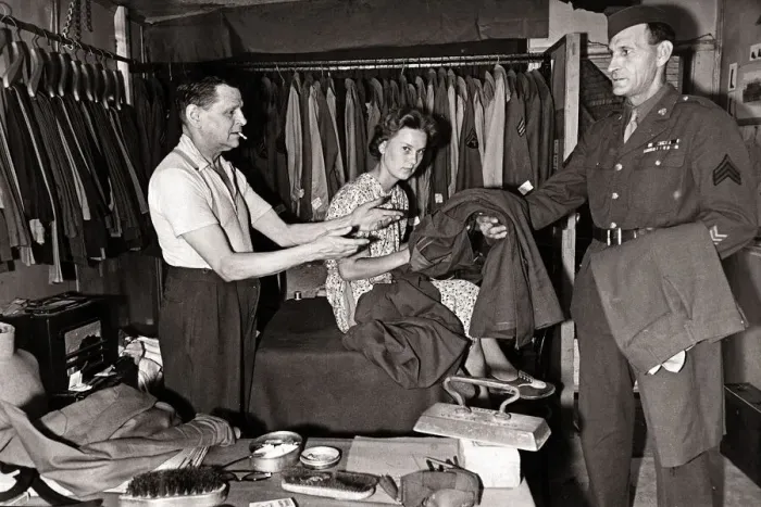 Framed Print : Mr. W. P. Worthy and his wife iron clothes for American troops in the West Country village Framed Print : Mr. W. P. Worthy and his wife iron clothes for American troops in the West Country village