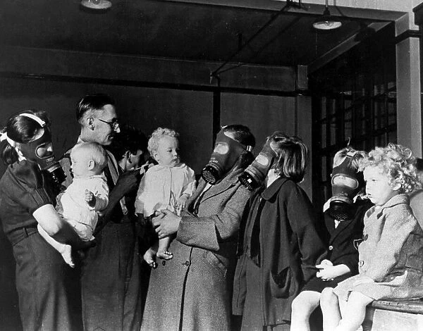 Mr Watkins and family being fitted with their gas masks at the guildhall in Kingston Upon