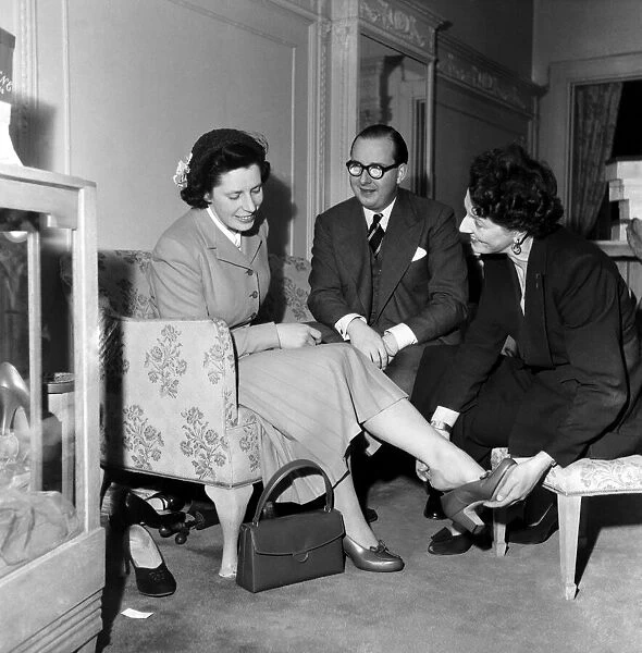 Mrs. Campbell with Edward Payw. Shoe designer. March 1953 D1341-002