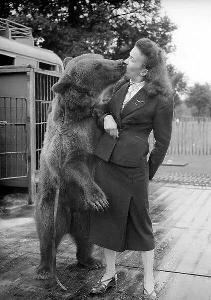 Mrs. E. Vogelbein Being kissed by a brown bear, it was quite a grizzly experience
