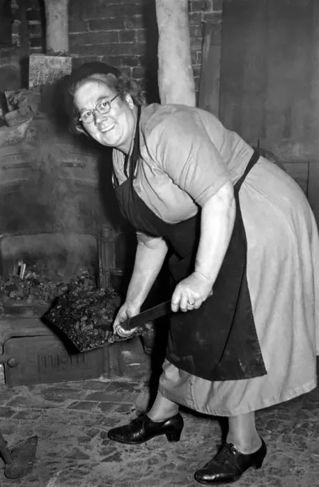 Framed Print : Mrs. Ethel Comeny Stoker, seen here feeding the boiler. October 1952 C5925-001 Framed Print : Mrs. Ethel Comeny Stoker, seen here feeding the boiler. October 1952 C5925-001