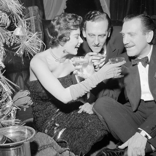 Mrs Eunice Gayson and Reg North at the Room 21 Christmas party December 1954