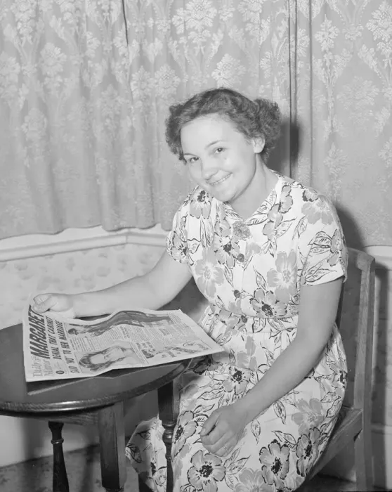 Framed Print : Mrs Higgins seen here reading about Princess Margaret and Peter Townsend in the Daily Framed Print : Mrs Higgins seen here reading about Princess Margaret and Peter Townsend in the Daily