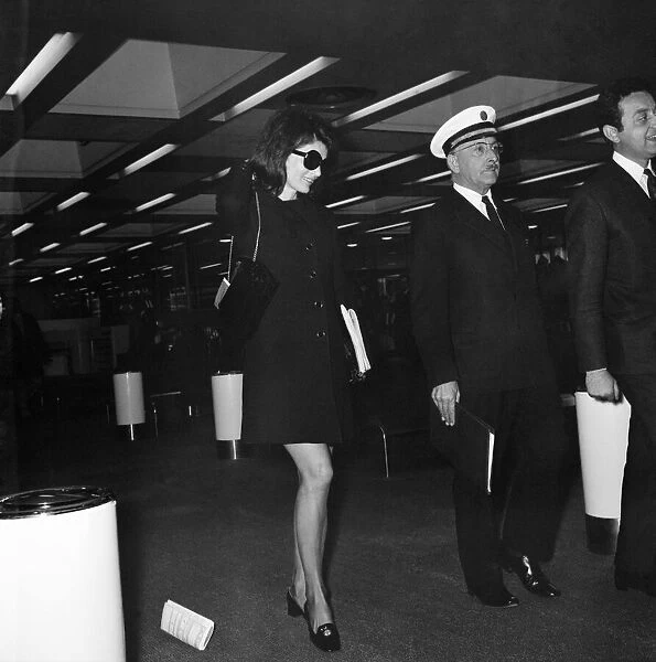 Mrs. Jacqueline Kennedy Onassis arrives at Heathrow Airport by Olympic Airways