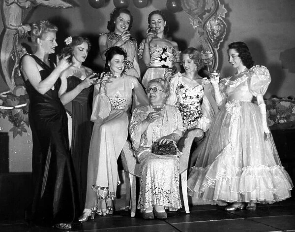 Mrs Laura Henderson owner of the Windmill Theatre with some of the Windmill Revudebelles