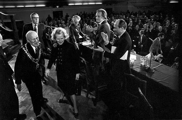 Mrs. Margaret Thatcher Talks to Tradesmen. Mrs. Margaret Thatcher leaves the Hall to a