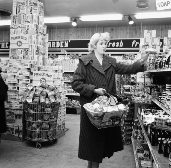 Framed Print : Mrs P Ray seen here shopping at the newly opened supermarket in North Finchley