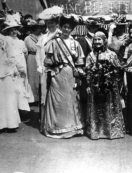 Mrs Pankhurst and Mrs Wolstanhokme Elmy the oldest suffragette at the at the Euston