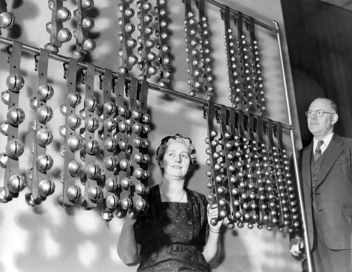 Framed Print : Mrs. Ritchie operates the 424 sleigh bells while her husband looks on in april 1960