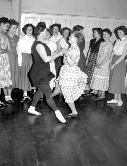 Framed Print : Mrs Sally Legg (in black) does a pas de basque and turn with a fellow member of her Framed Print : Mrs Sally Legg (in black) does a pas de basque and turn with a fellow member of her