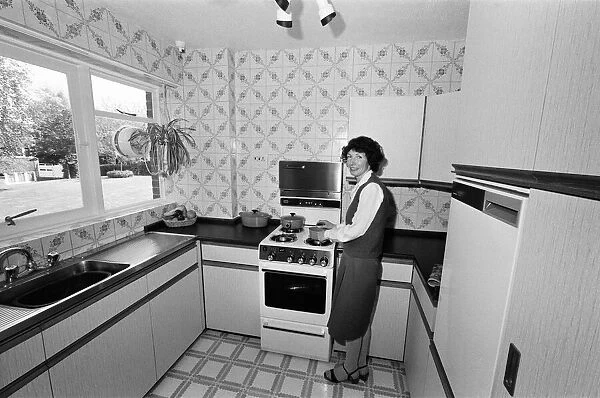 Mrs Singleton of Croydon has had her kitchen done up by a new cheap method that entails