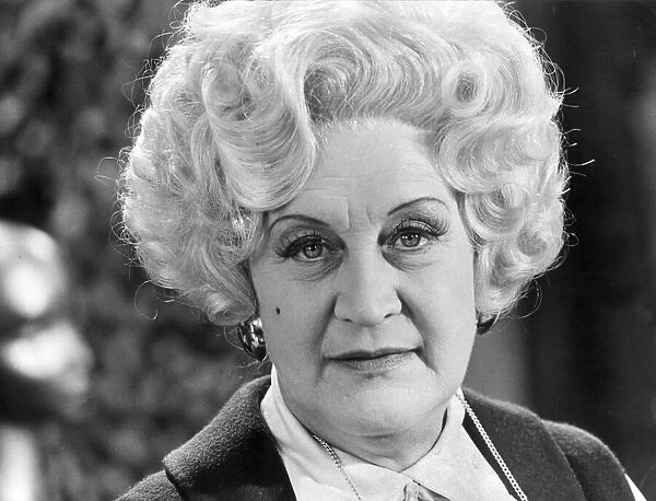 Mrs Slocombe (Actress Molly Sugden) seen here on the set of the film of the tv series