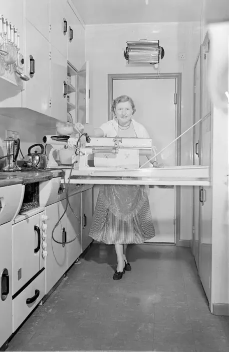 Framed Print : Mrs Susan Davies seen here using her rotary iron in a kitchen full of labour saving Framed Print : Mrs Susan Davies seen here using her rotary iron in a kitchen full of labour saving