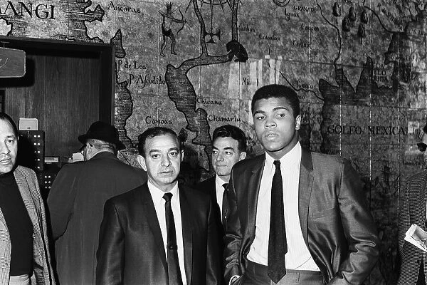 Muhammad Al in with trainer Angelo Dundee. Circa 1967