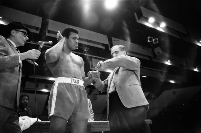 Framed Print : Muhammad Ali clowns around for the cameras leading up to his first fight with Joe Framed Print : Muhammad Ali clowns around for the cameras leading up to his first fight with Joe