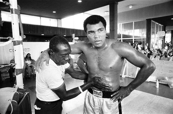 Muhammad Ali getting a rub down ahead of his third fight with Ken Norton