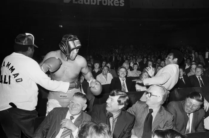 Framed Print : Muhammad Ali having fun with a spectator at boxing exhibition match in Birmingham Framed Print : Muhammad Ali having fun with a spectator at boxing exhibition match in Birmingham