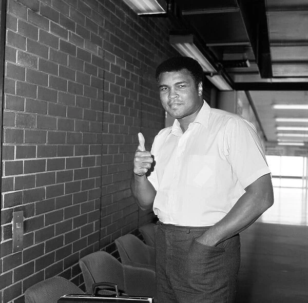 Muhammad Ali at Heathrow Airport London before his departure to Los Angeles