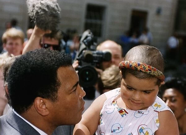 Muhammad Ali former Heavyweight World Boxing Champion with Lucy Grant who is fighting