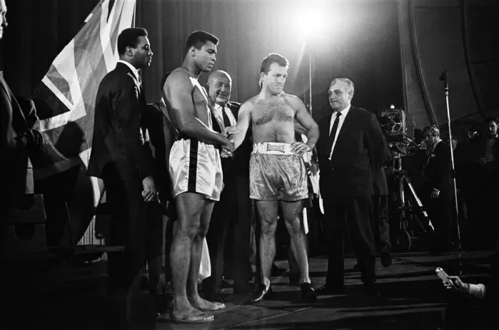 Framed Print : Muhammad Ali (left) and Brian London shake hands at the weigh-in ahead of their Framed Print : Muhammad Ali (left) and Brian London shake hands at the weigh-in ahead of their