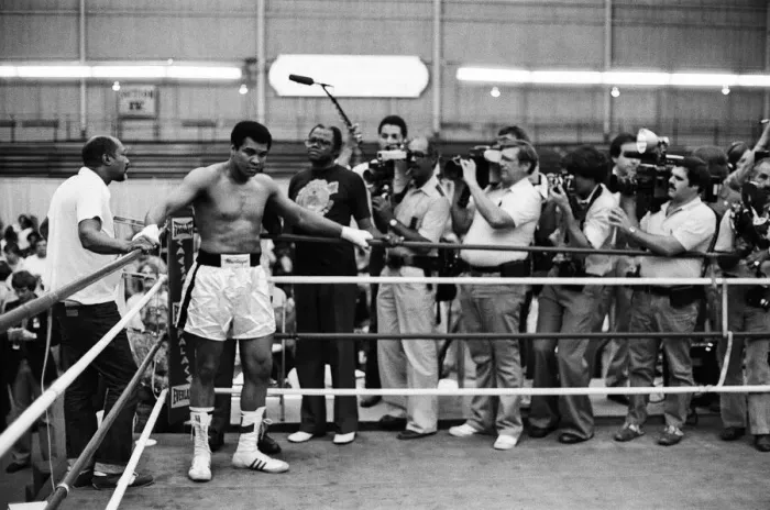 Framed Print : Muhammad Ali mobbed by reporters in his training camp ahead of his upcoming fight against Framed Print : Muhammad Ali mobbed by reporters in his training camp ahead of his upcoming fight against