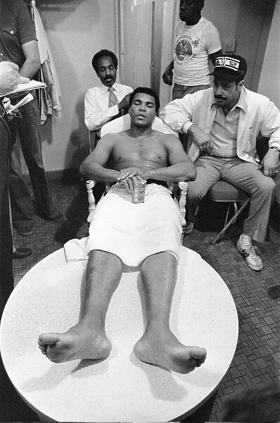 Muhammad Ali relaxing ahead of his second fight with Leon Spinks to be held at