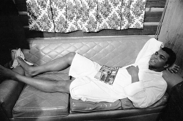 Muhammad Ali relaxing in Deer Lake Pennsylanvia. January 1974