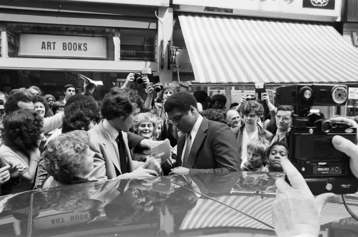 Framed Print : Muhammad Ali signing autographs outside the Odeon in Birmingham. 7th June 1979 Framed Print : Muhammad Ali signing autographs outside the Odeon in Birmingham. 7th June 1979