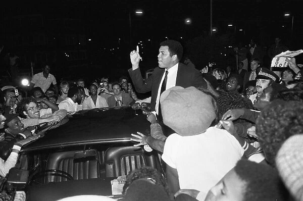 Muhammad Ali speaking to enthusiastic fans in Handsworth Birmingham