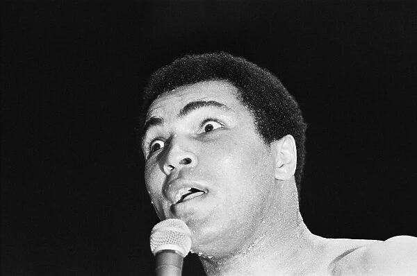 Muhammad Ali speaking at his training camp in Deer Lake Pennsylvania