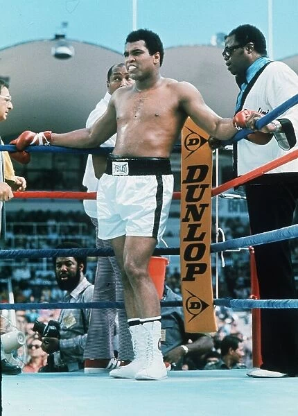 Muhammad Ali stands in the corner of the ring during the heavyweight world title fight