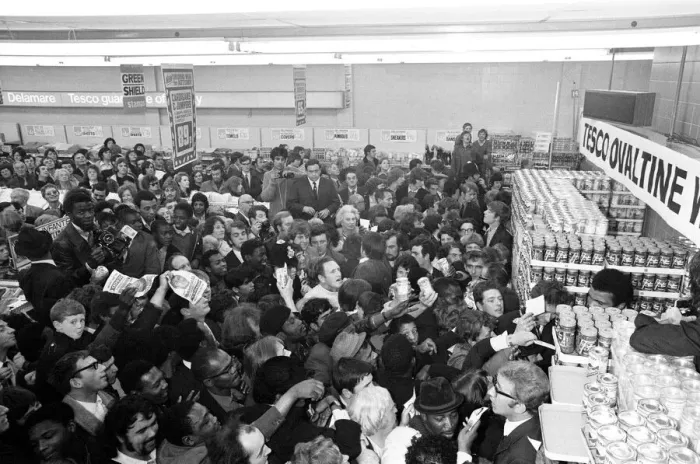 Framed Print : Muhammad Ali at a supermarket in Stretford to promote Ovaltine cornered by loads of fans
