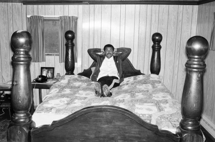 Framed Print : Muhammad Ali in training at his camp. He shows off his four poster bed. 2nd May 1980 Framed Print : Muhammad Ali in training at his camp. He shows off his four poster bed. 2nd May 1980
