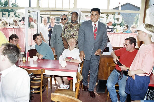 Muhammad Ali visits a cafeteria in London England. 26th May 1992