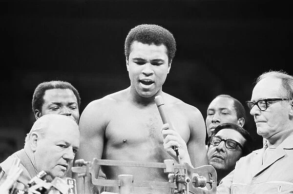 Muhammad seen here at the weigh before his world champion fight against Joe Frazier at