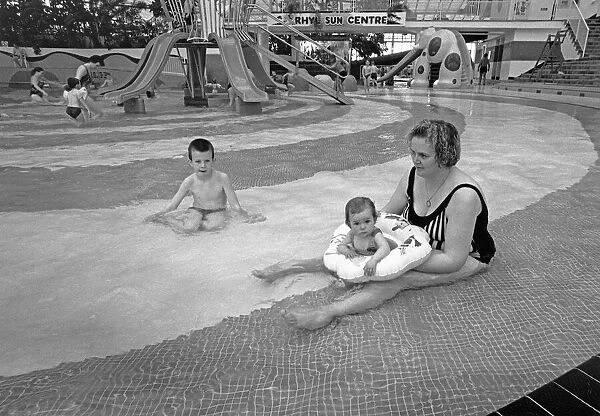 Mum and baby enjoy the shallow pool at The Suncentre, Rhyl