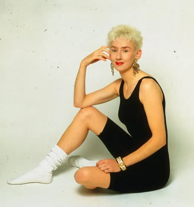 Framed Print : Muriel Gray TV presenter sitting on floor wearing black leotard and white socks Framed Print : Muriel Gray TV presenter sitting on floor wearing black leotard and white socks