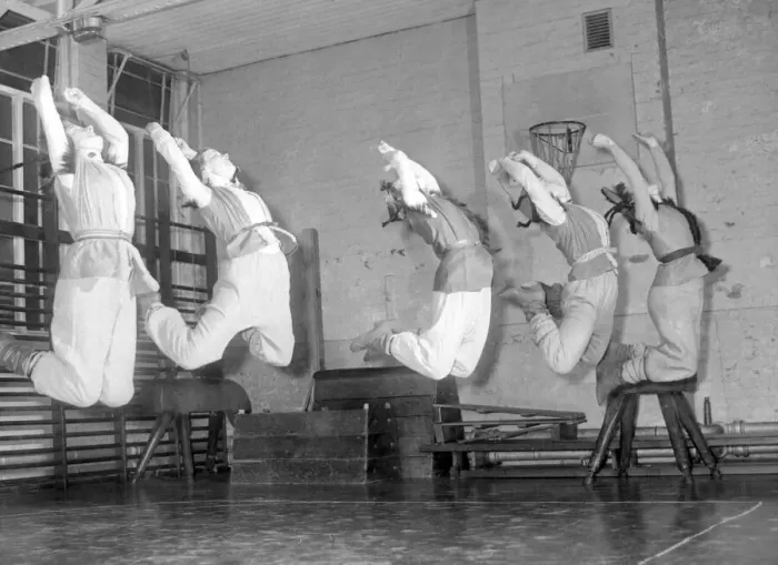 Framed Print : Muscles trained in the B. A. I. gymnasium are put to practical use here as five girls Framed Print : Muscles trained in the B. A. I. gymnasium are put to practical use here as five girls